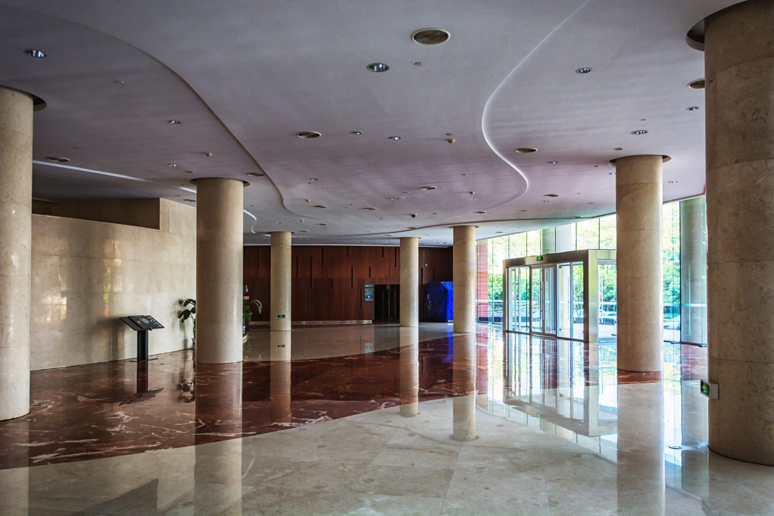 elegant stools and table in huge and bright hall